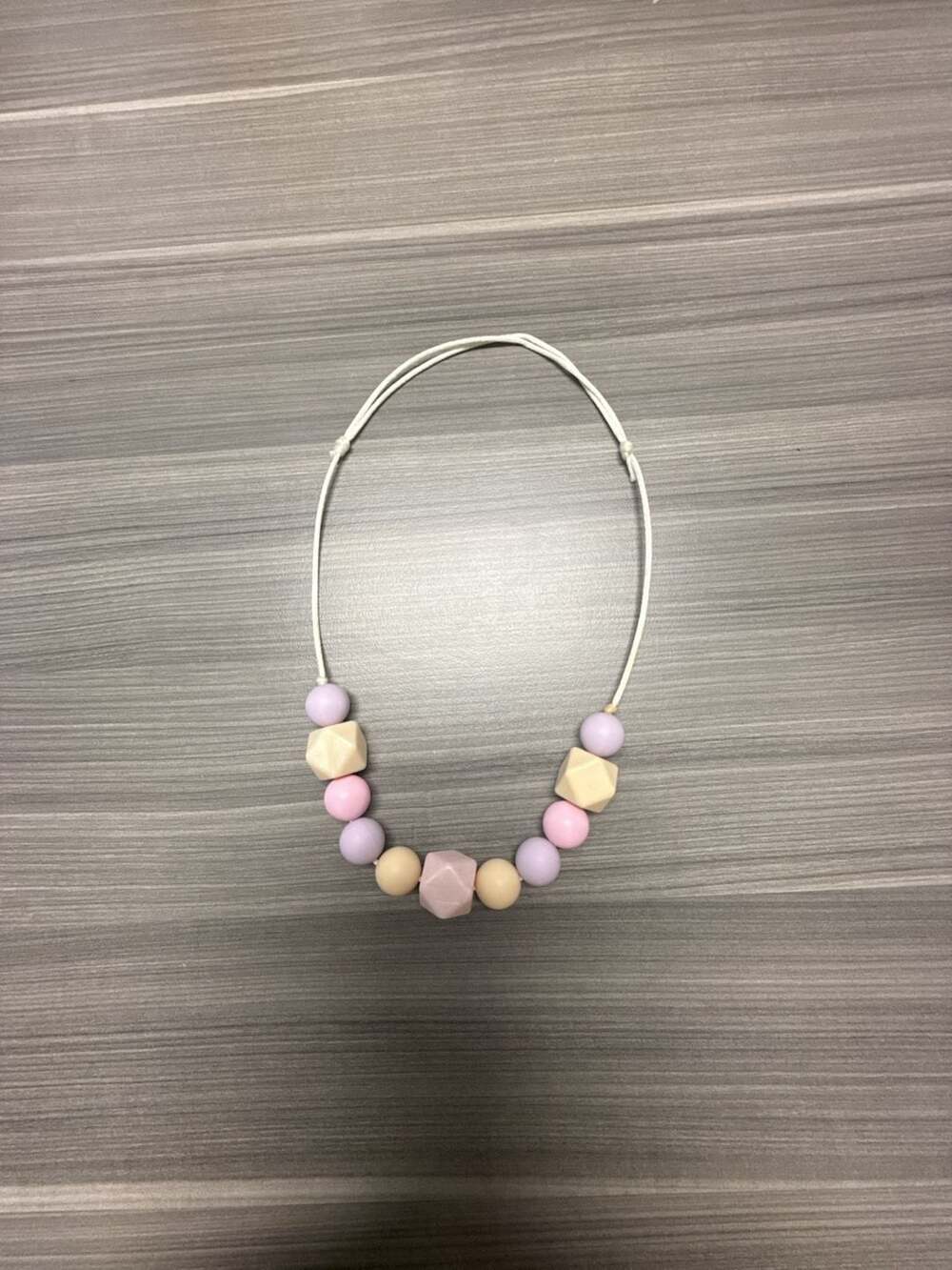 Silicone Teething and Nursing Necklace with Geometric and Round Pastel Beads